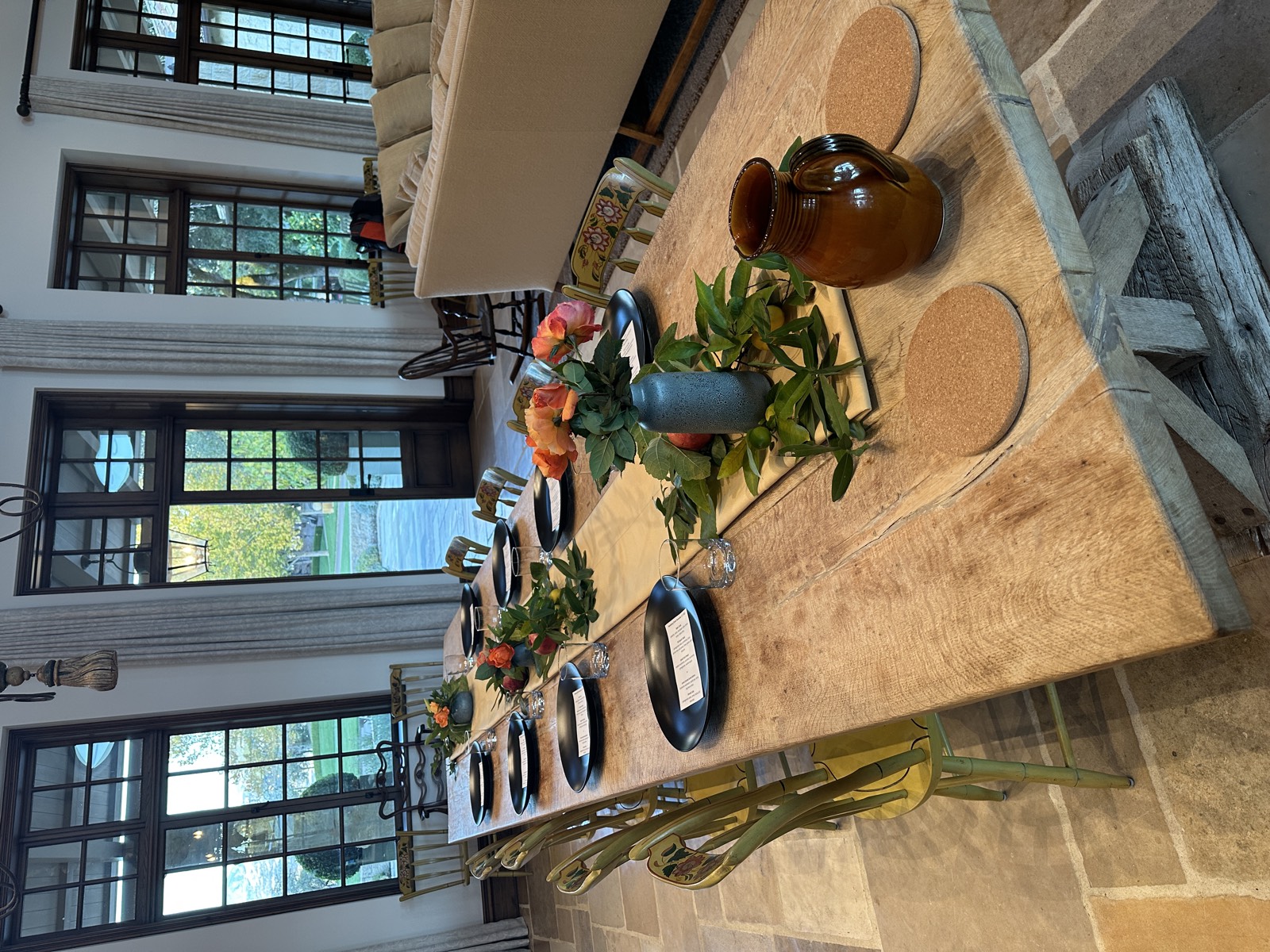 Dining room with rustic table set for dinner