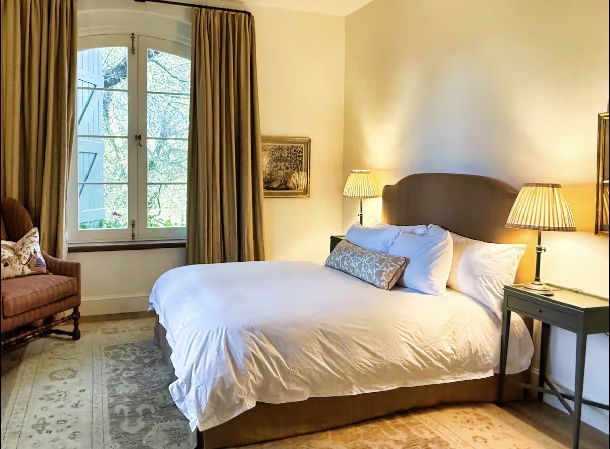 Guest bedroom with upholstered headboard